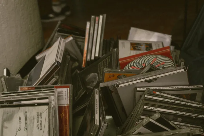 Cracked Cases and Liner Notes: The Quiet Magic of '90s CD Packaging That Streaming Killed